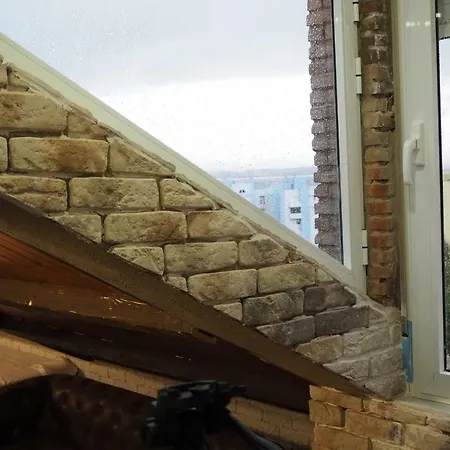 Tiny On The Roof Touching Gibraltar